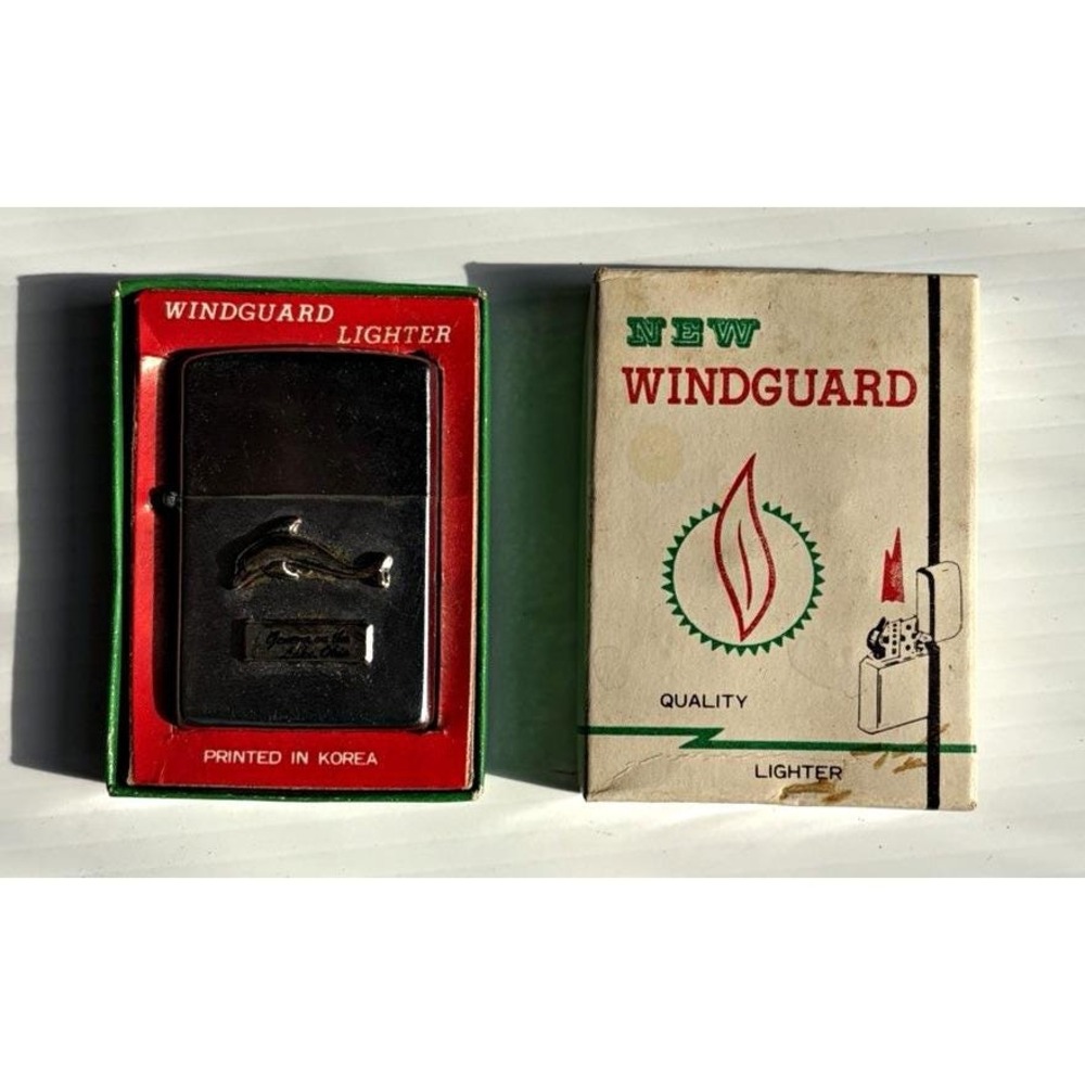 Windguard Silver Pocket Lighter Dolphin Emblem in Box "Printed in Korea"